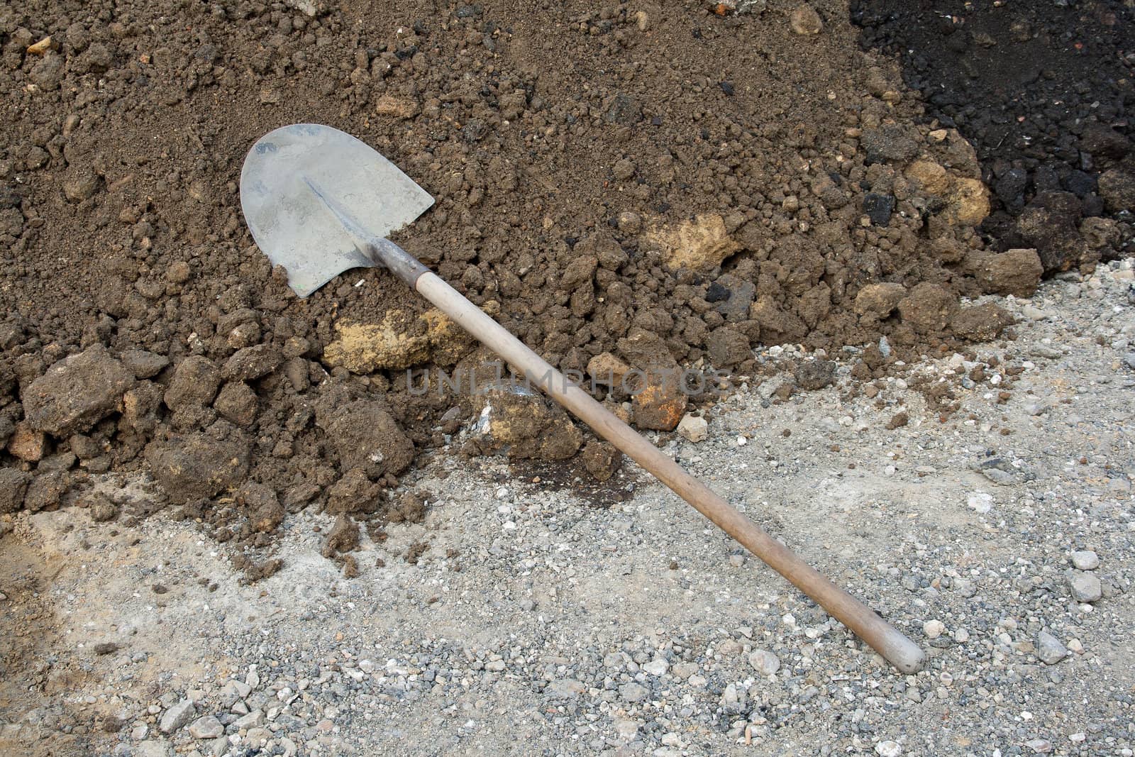 shovel left on the ground, stop activity