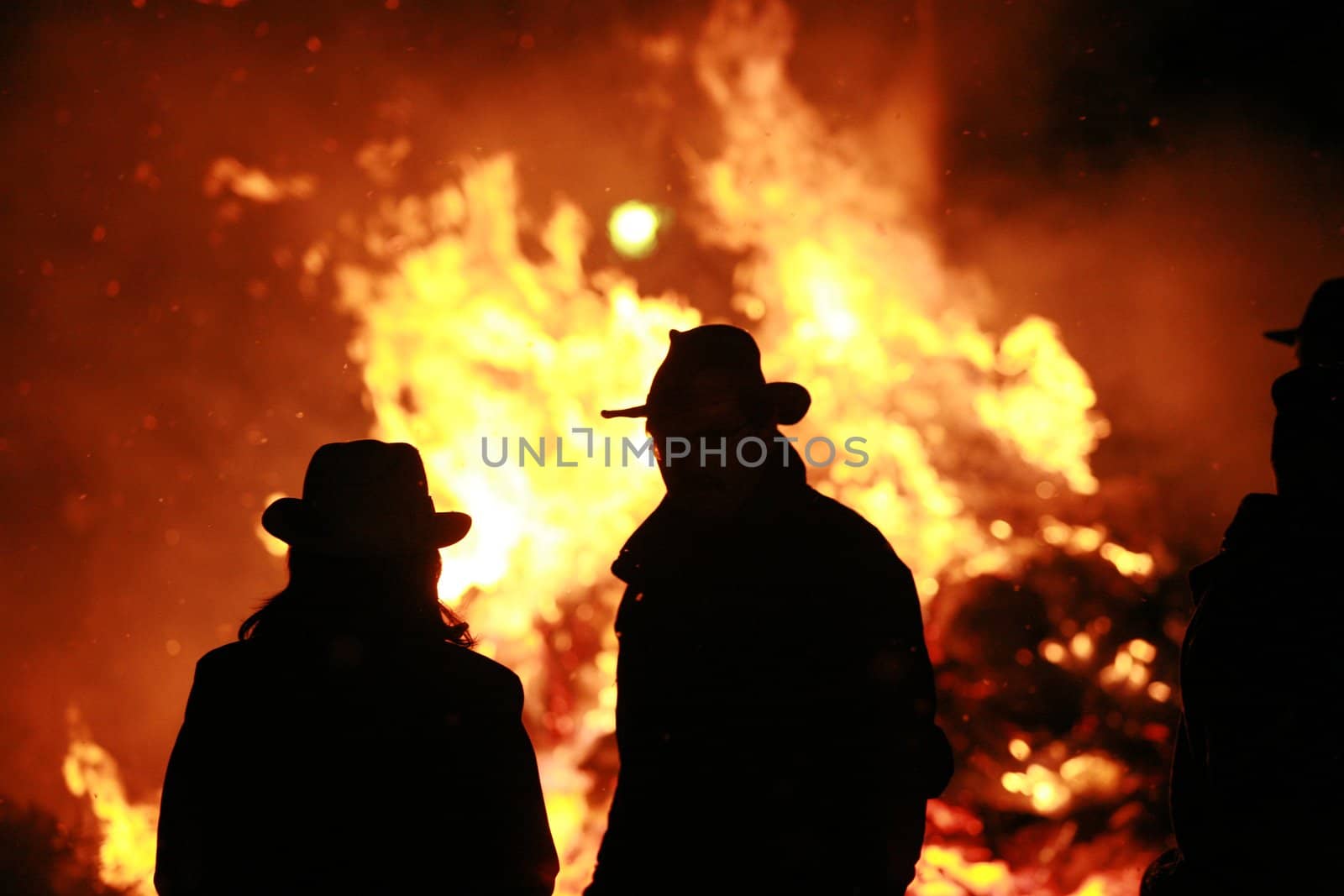 Close-up of some people coming out of fire