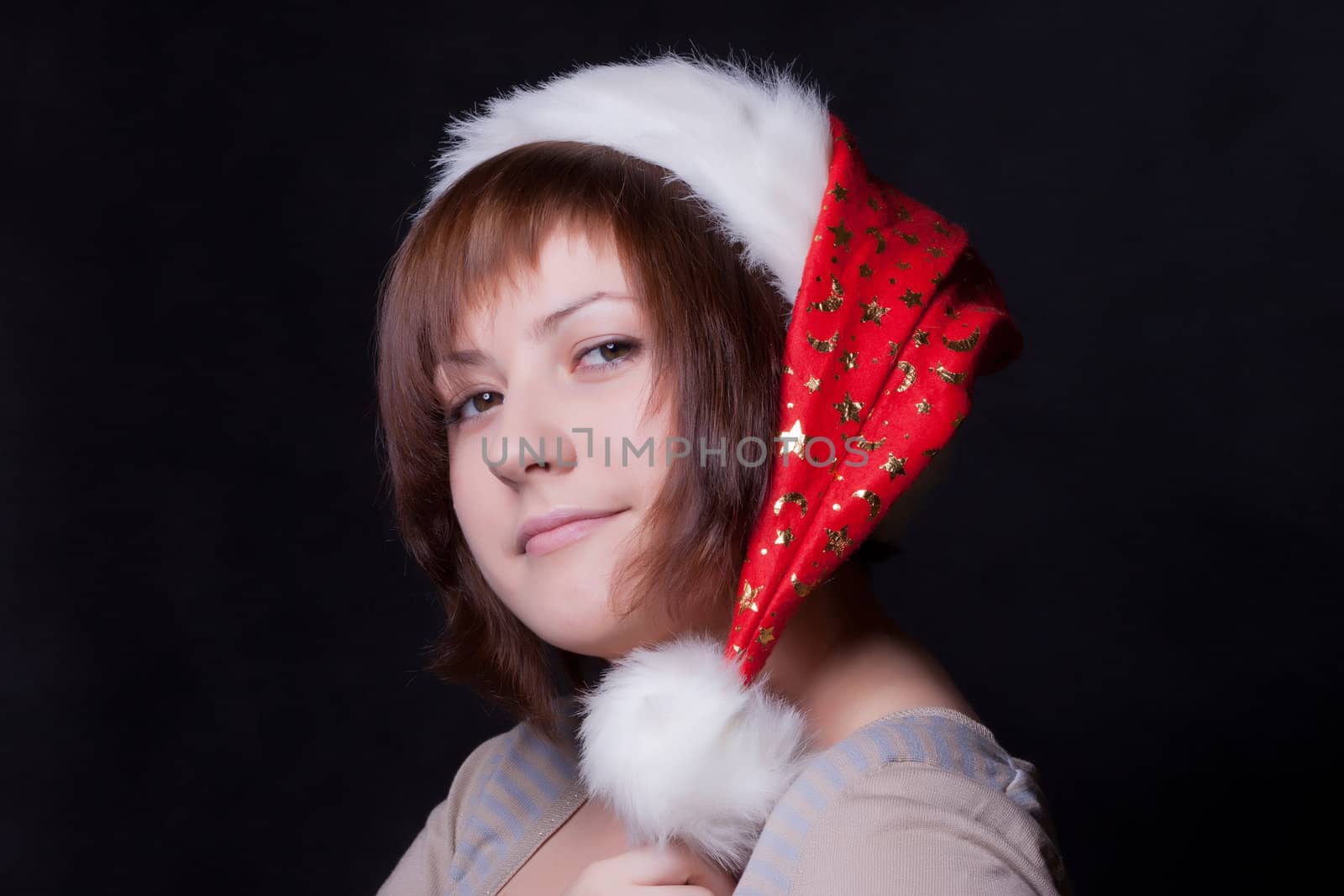 young woman in christmas cap by Discovod