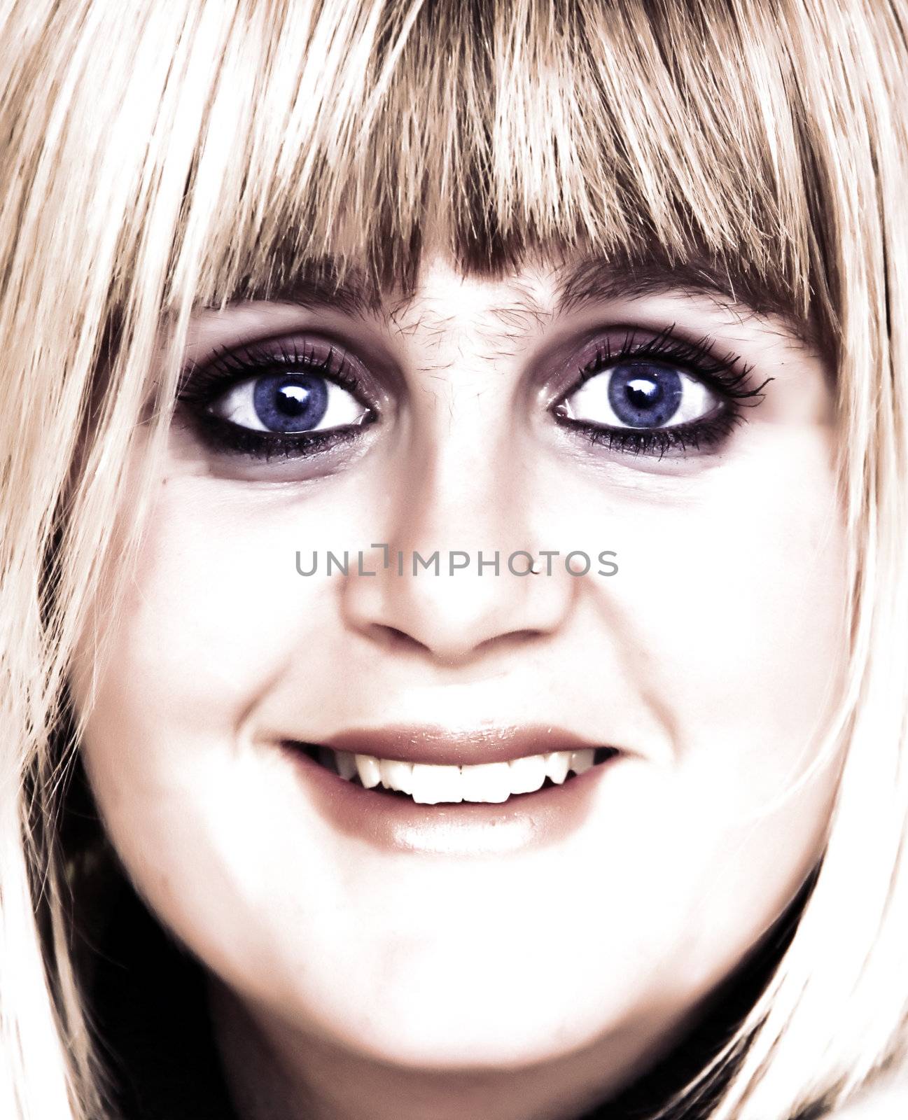 high key image of a pretty woman looking with big eyes and copyspace for your text