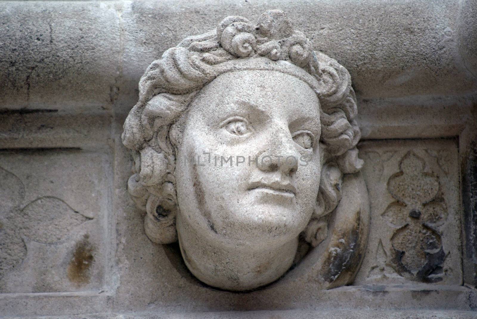 Head, Antique bas-relief by atlas