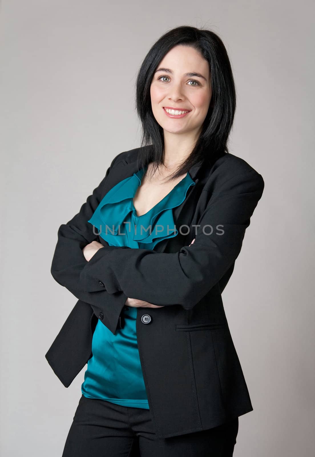 Portrait of a business woman with her arms crossed.