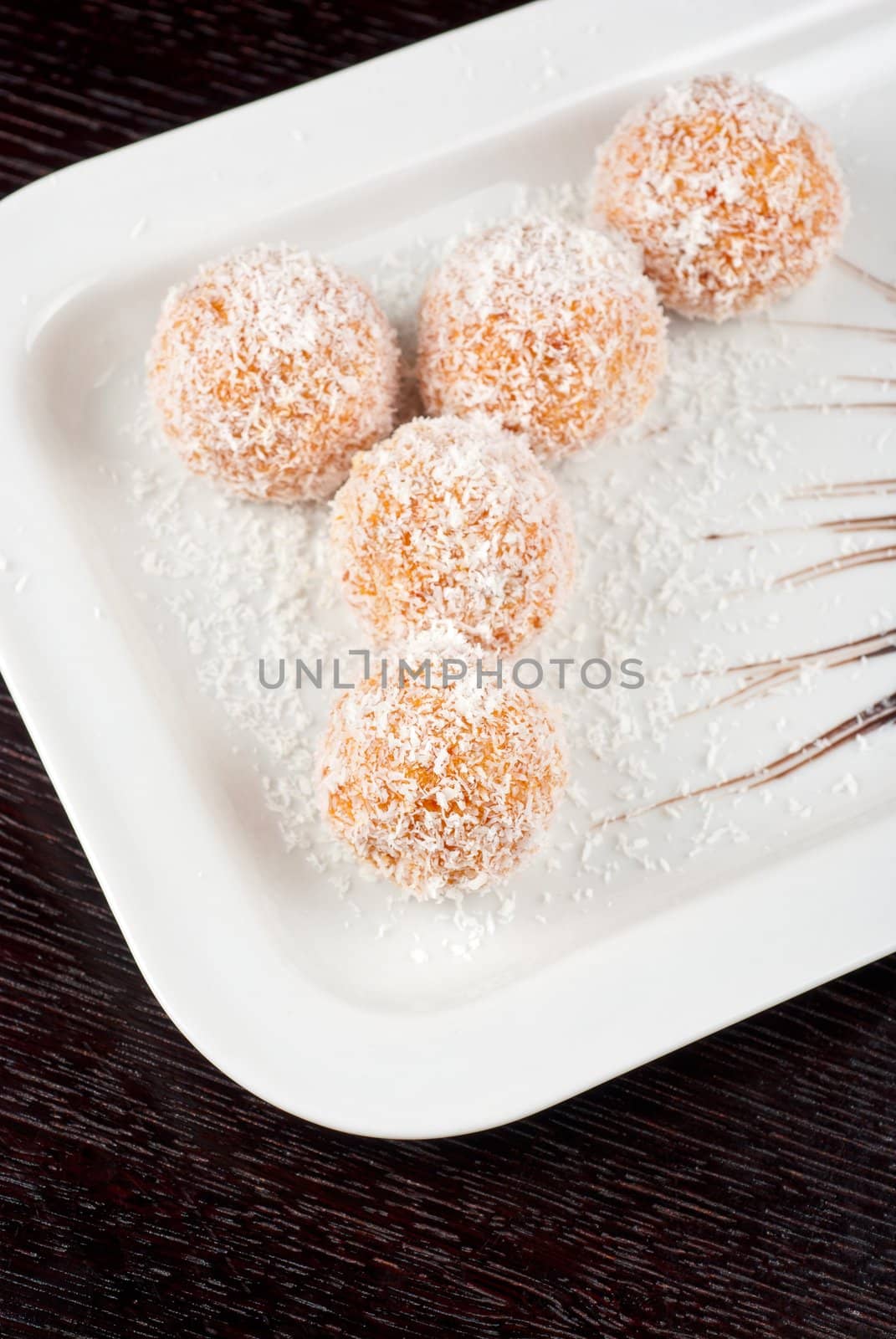 fresh baked cupcake closeup on a white plate