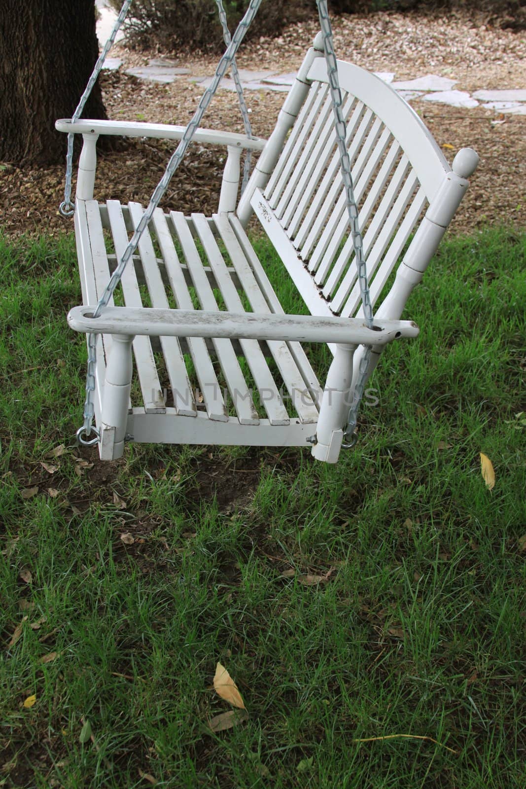 Close up of a swinging bench.