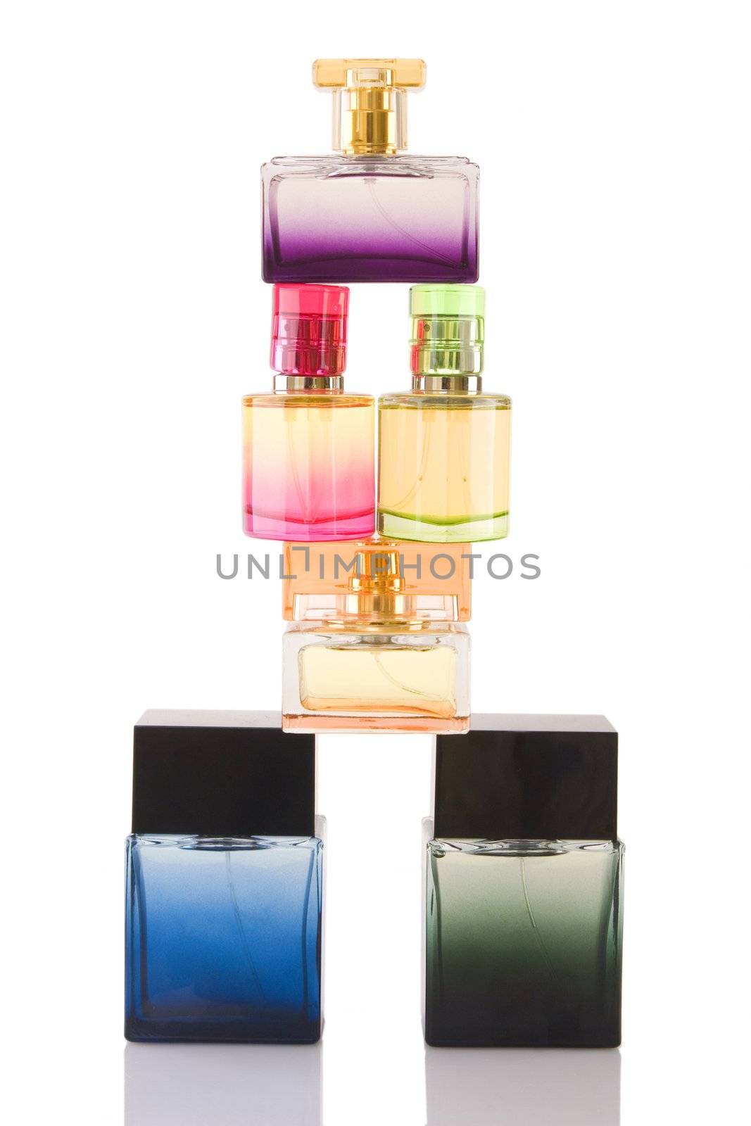 Perfume in glass bottles on white background