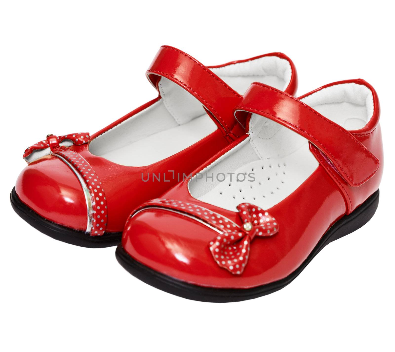 Lady's red shoes isolated on white background