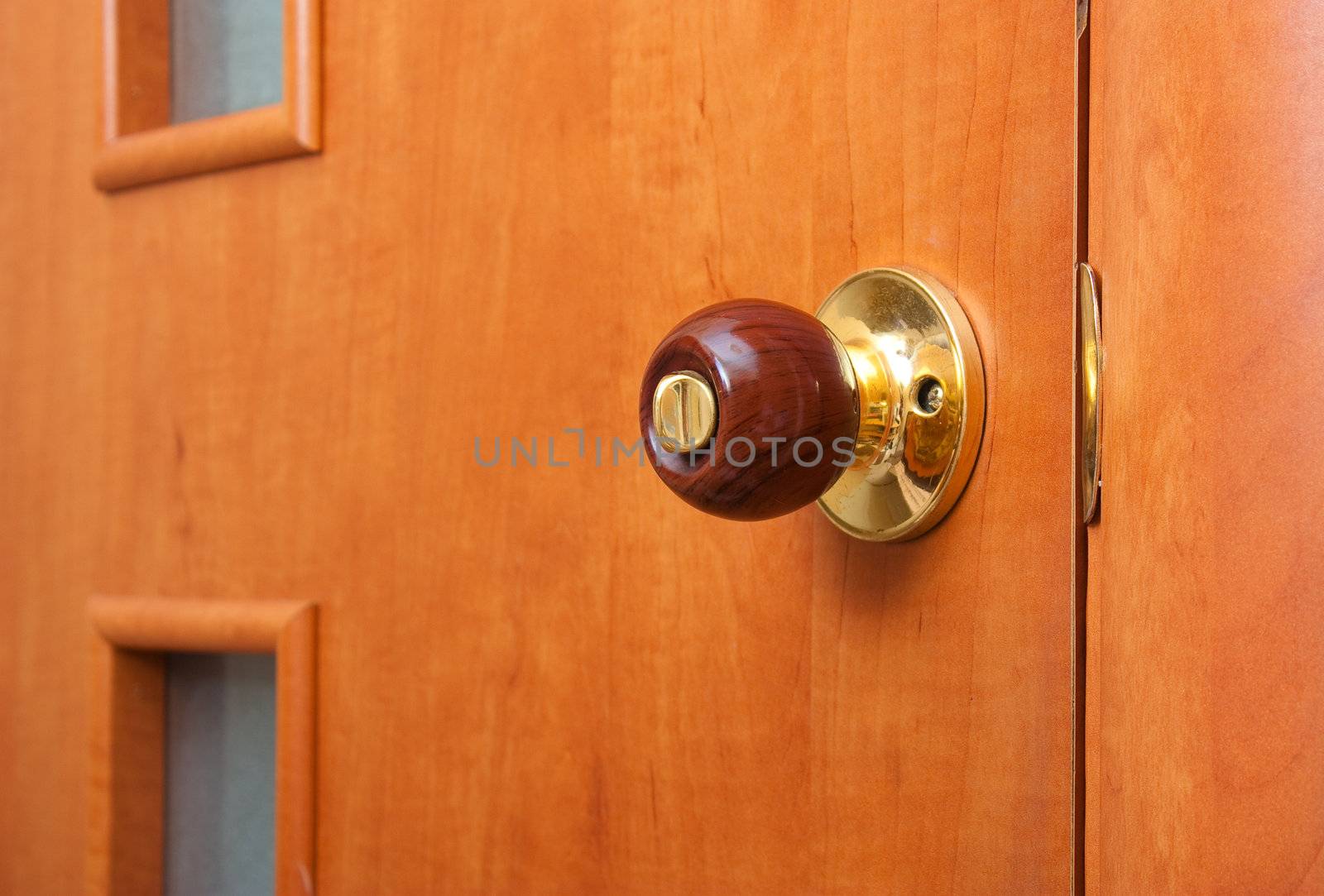 wooden handle of the door