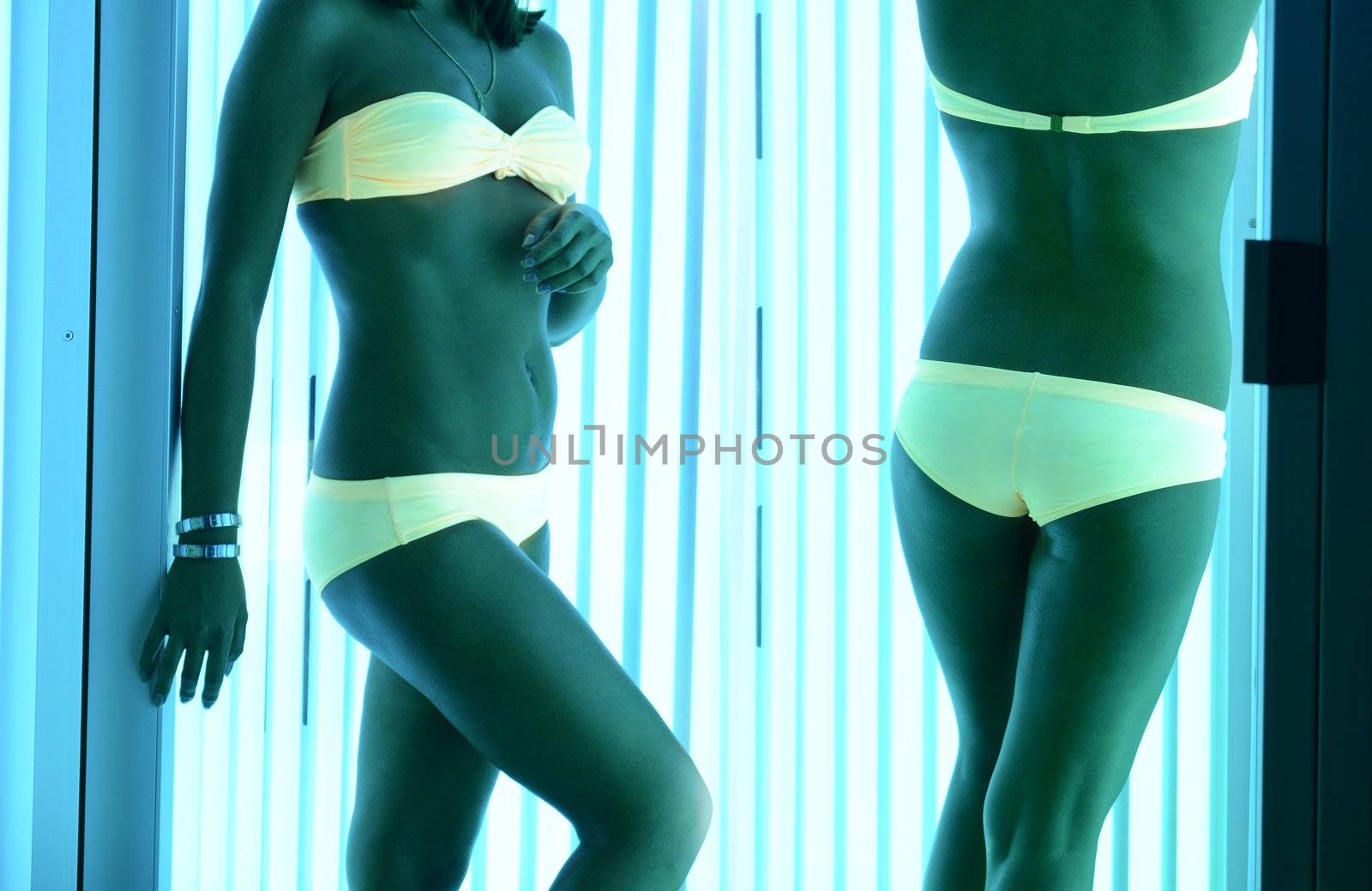 beautiful girl closeup in swimsuit at solarium