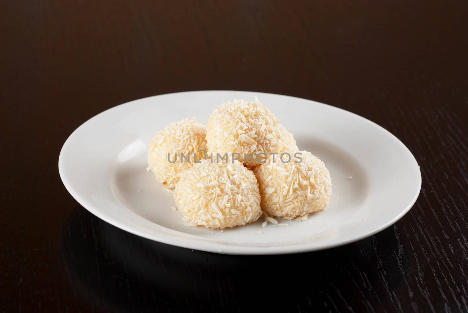 fresh baked cupcake closeup on a white plate