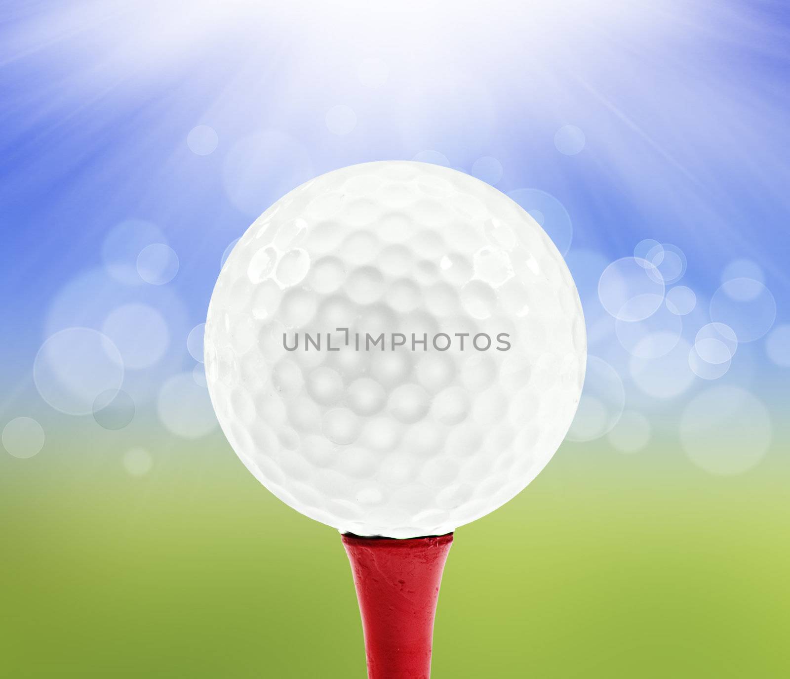 Spring background with a golf ball on a peg by tish1