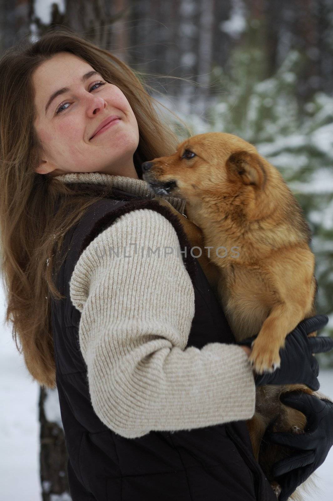 girl and a white dog in winter forest by kasim