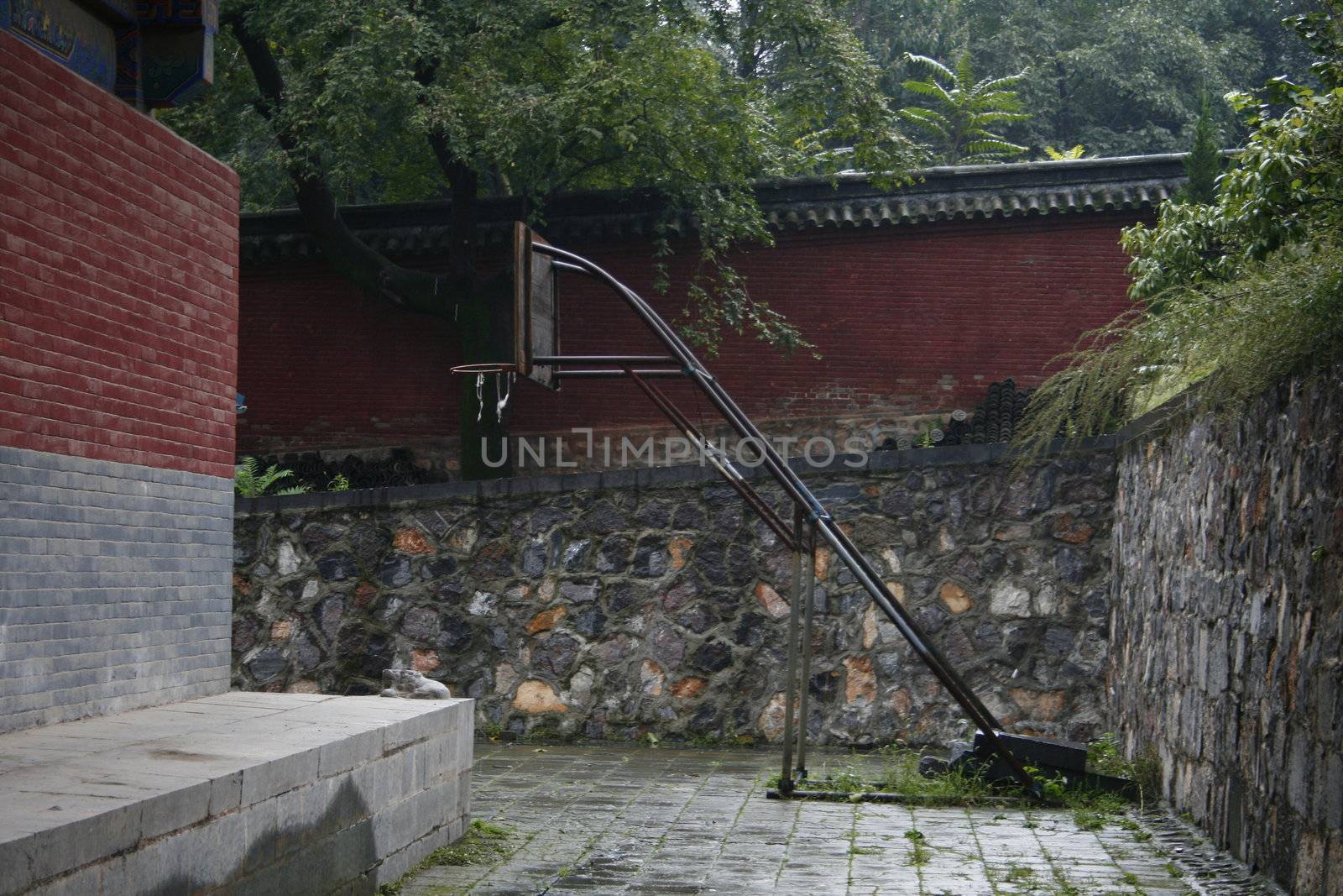 Basketball hoop in the temple of Shaolin monks, Ch by koep