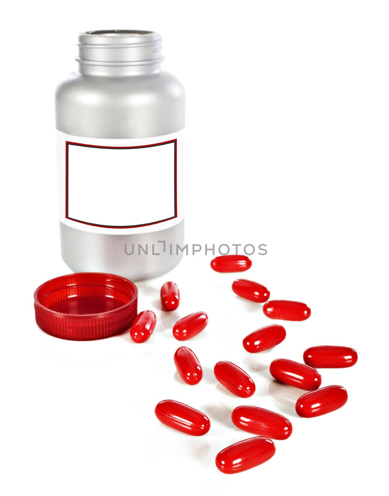 a Bottle of red pills on a white background with space for text