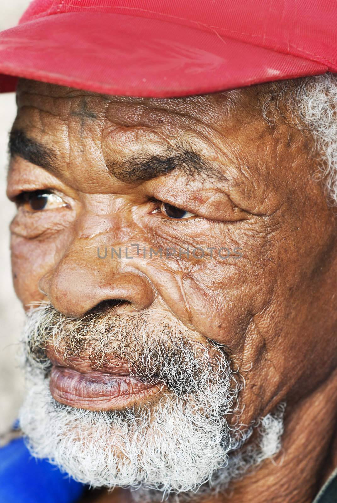 Old African black man with characterful face