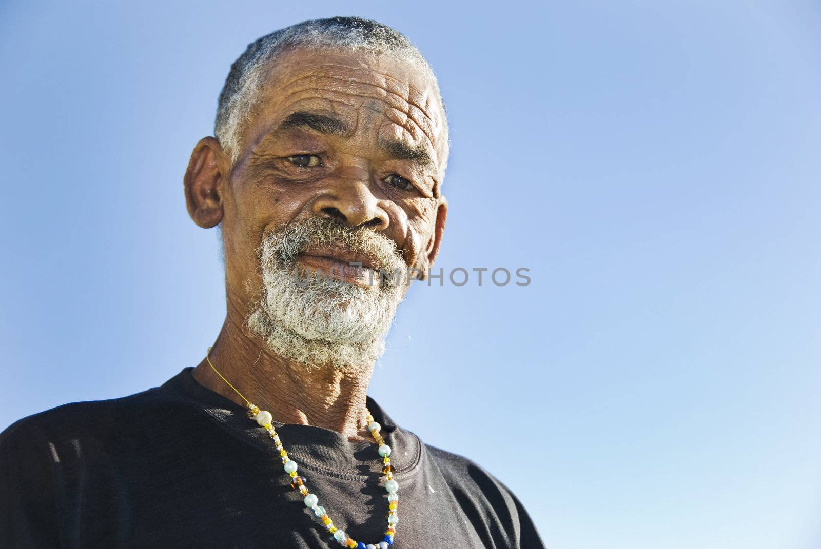 Old African black man with characterful face