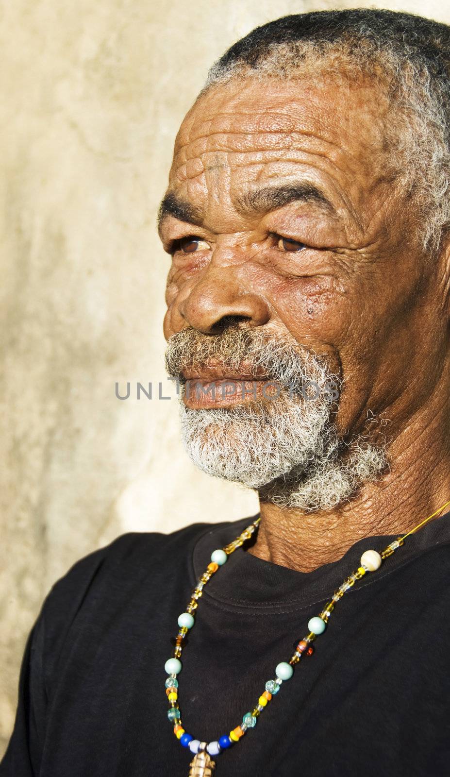 Old African black man with characterful face