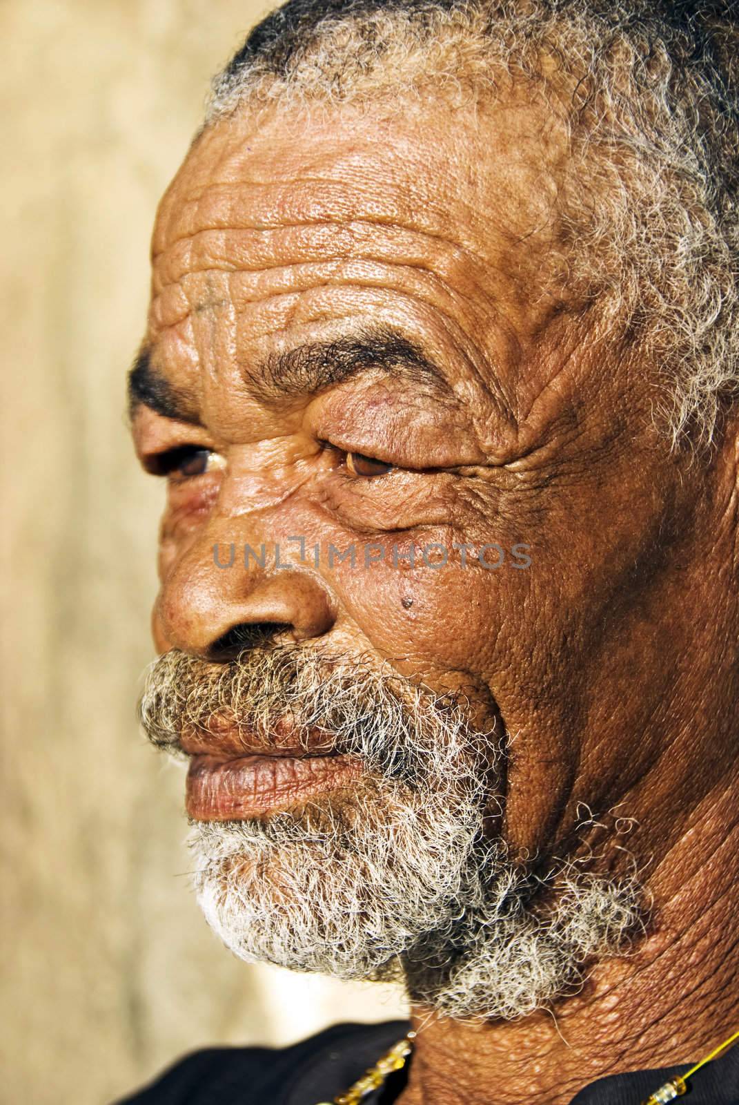 Old African black man with characterful face