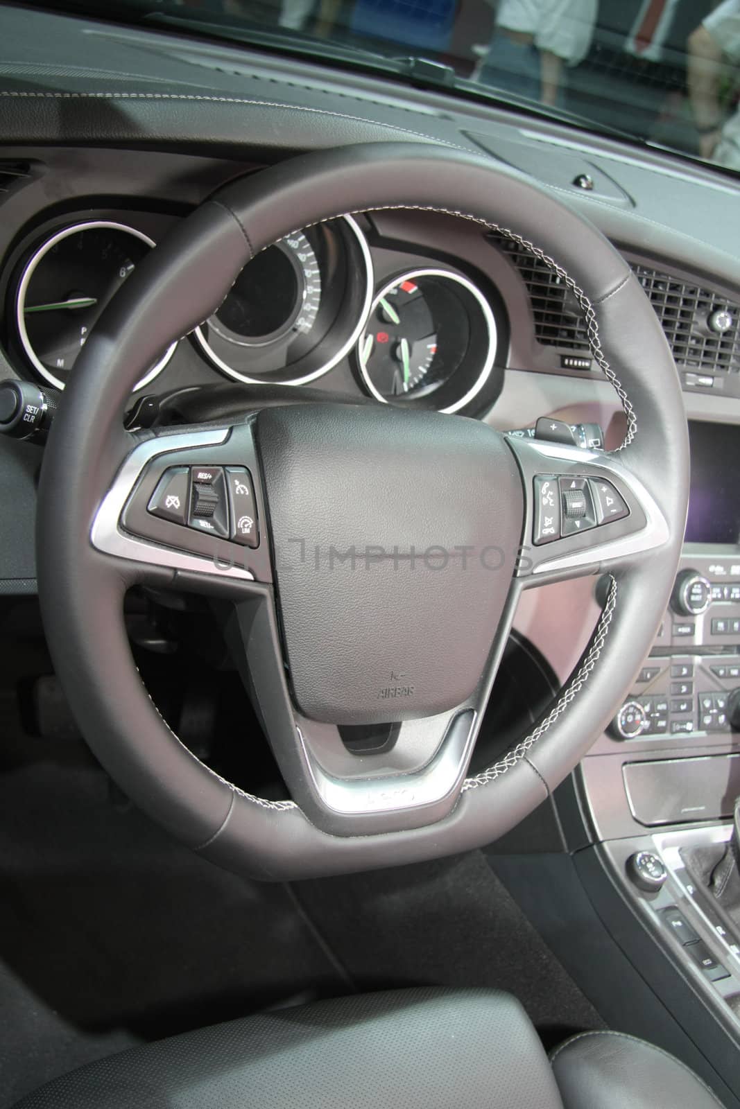 A black leather dashboard of a contemporary car