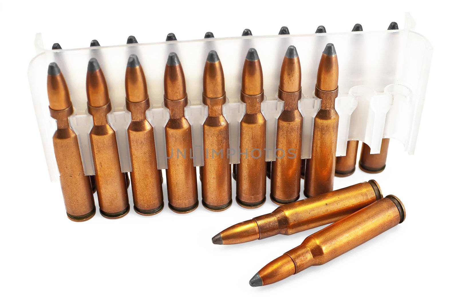Packing ammunition for the automatic weapons and two cartridges lie separately isolated on a white background
