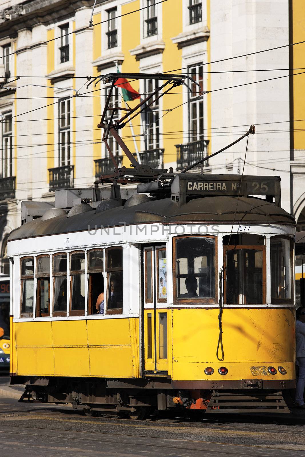a Typical Tram in old street, Lisbon, Portugal 
