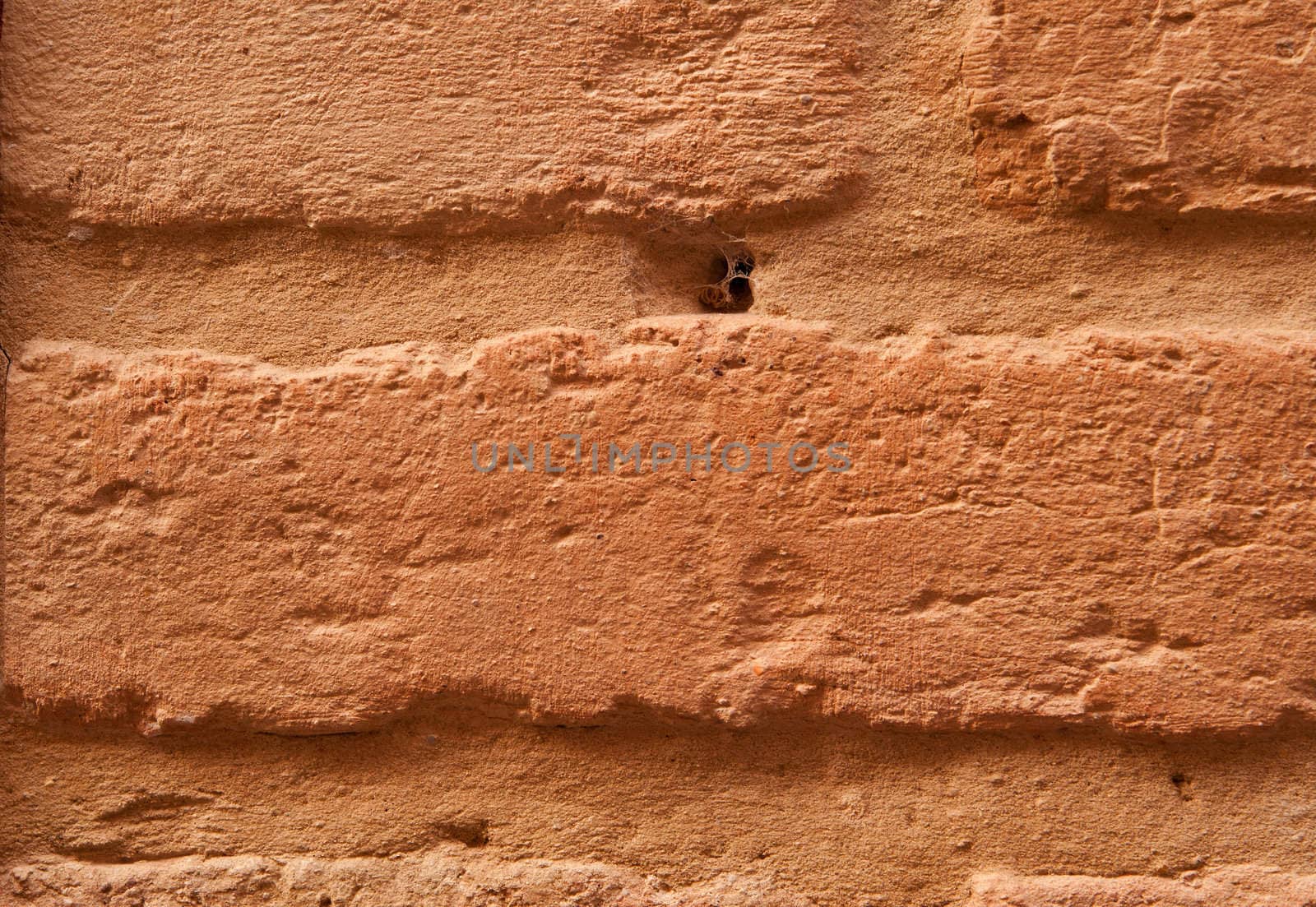 Old brick brown wall is closeup for the texture