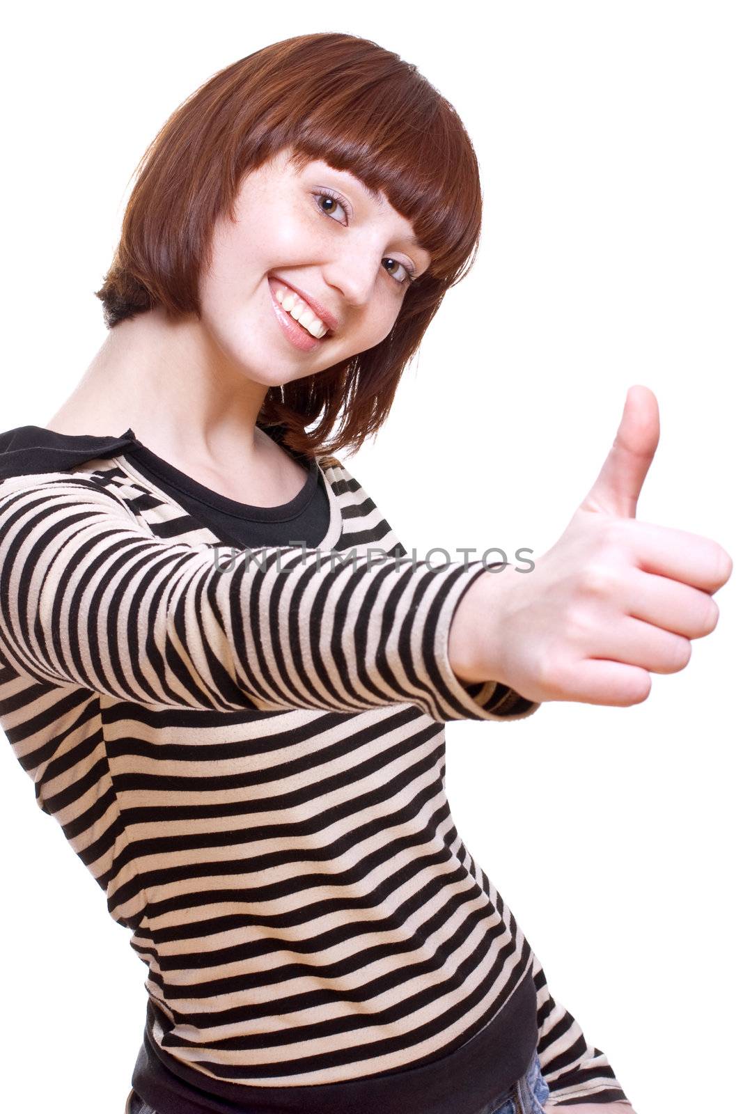 laughing girl in a T-shirt giving thumbs-up on a white background