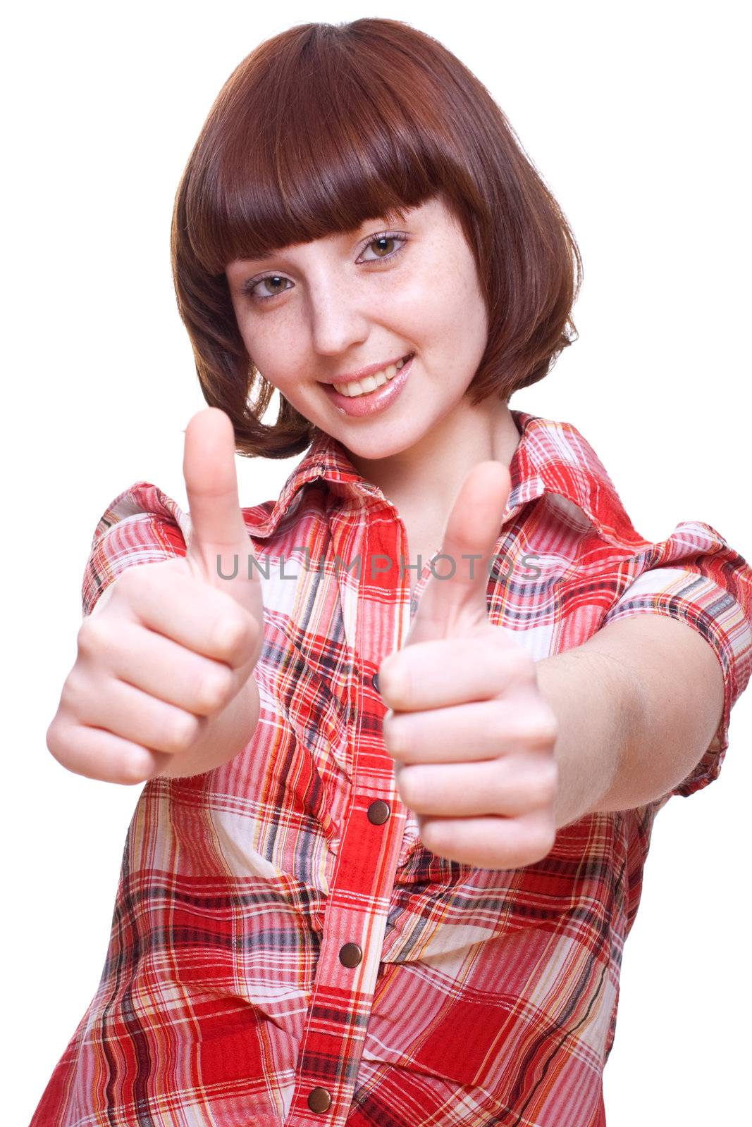 laughing girl in a shirt giving thumbs-up on a white background