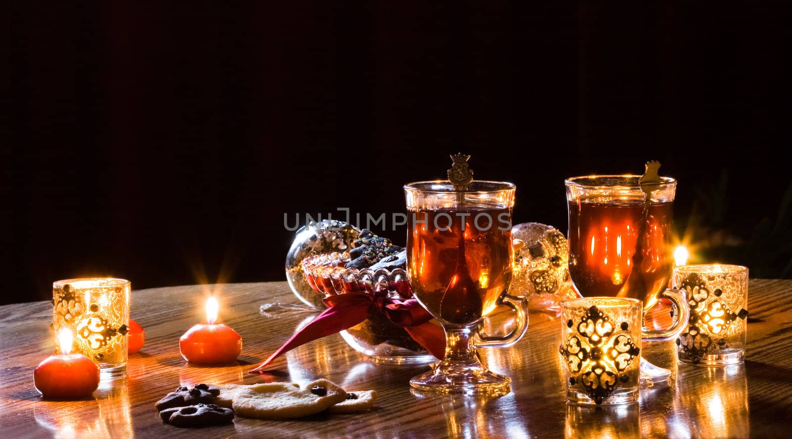 Tea time in christmastime with tea and homemade cookies