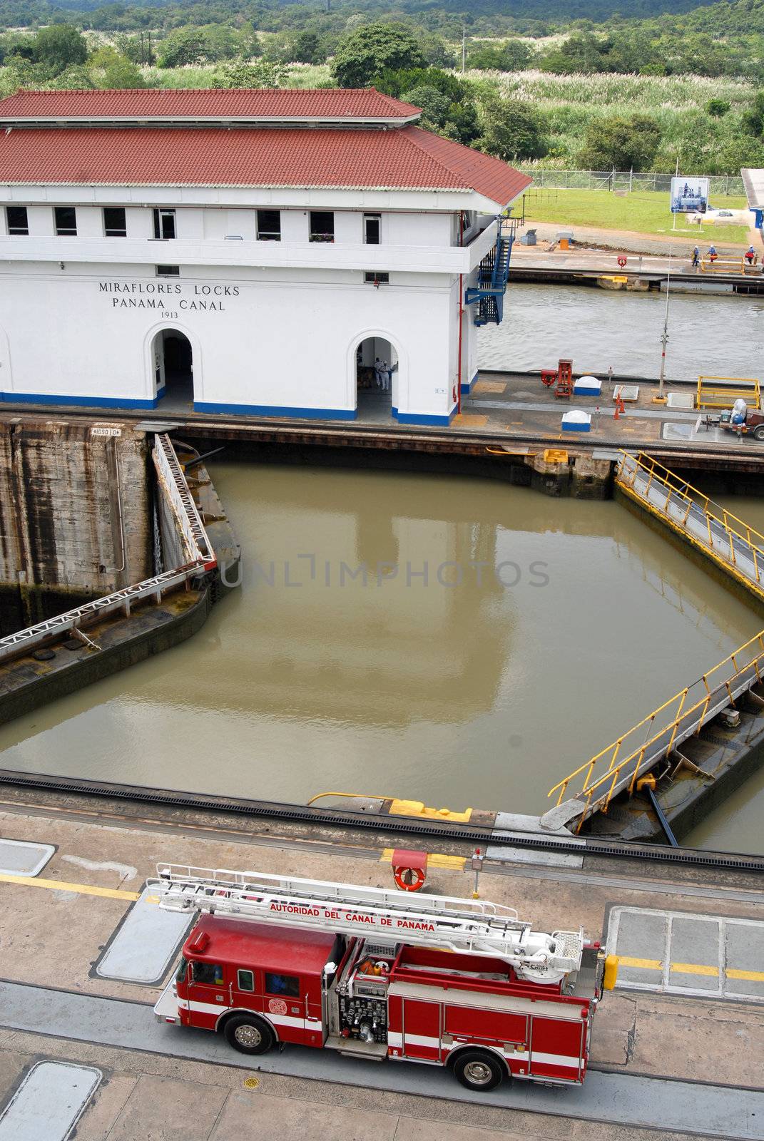 PANAMA-SEPTEMBER 10. Fire truck controls the safety at Miraflores Locks on September 10, 2006 in Panama Canal. In April 2011 a $43 Million Contract Awarded for Design and Construction of New Backhoe Dredge.