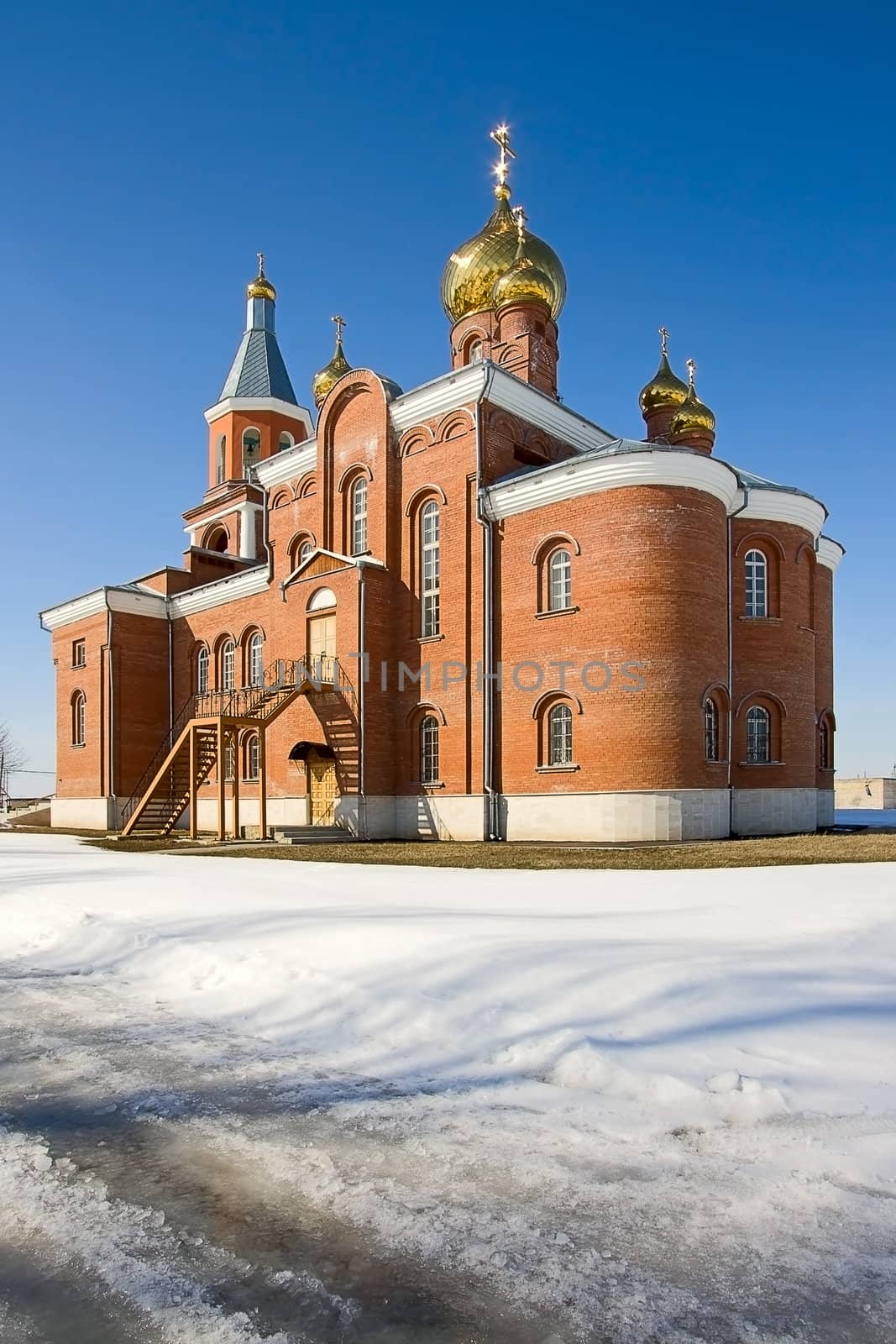 View of  beautiful church in  winter against  blue sky, Russia.