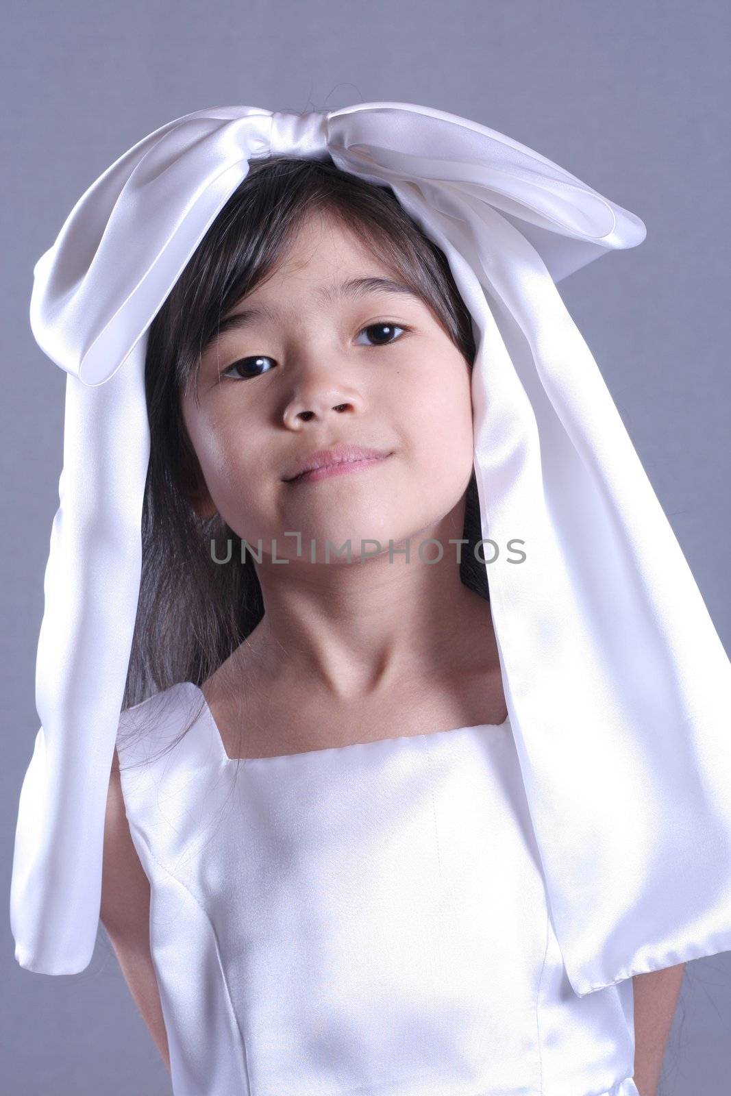 Cute little girl playing dress up by jarenwicklund