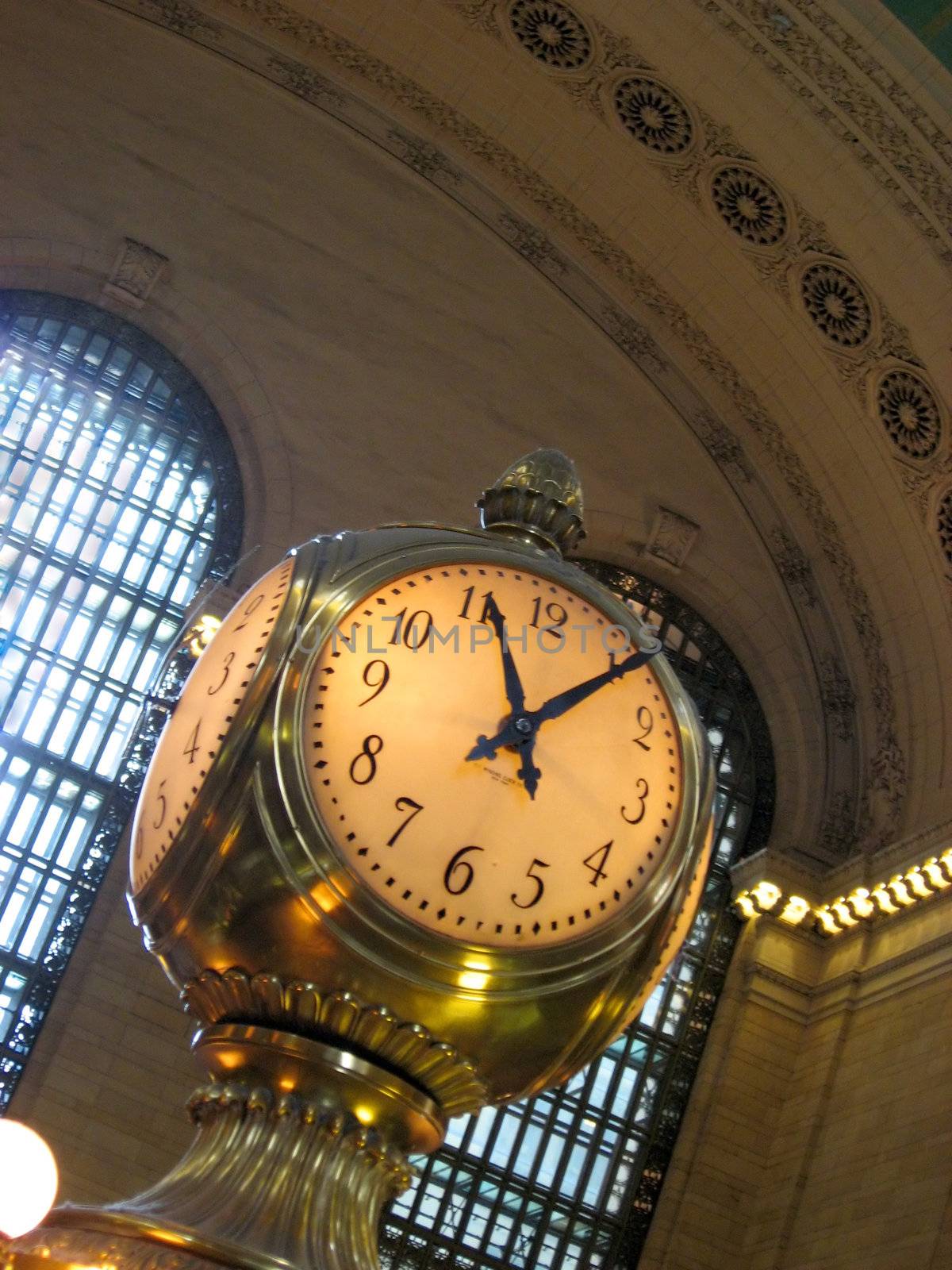 The old clock in the center of grand central station in New York City.