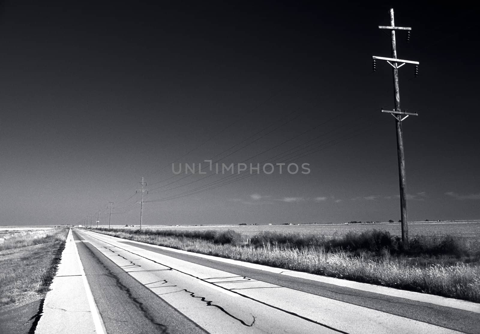 Horizontal Black and White Blacktop Highway 86 near Silverton Texas by hotflash2001