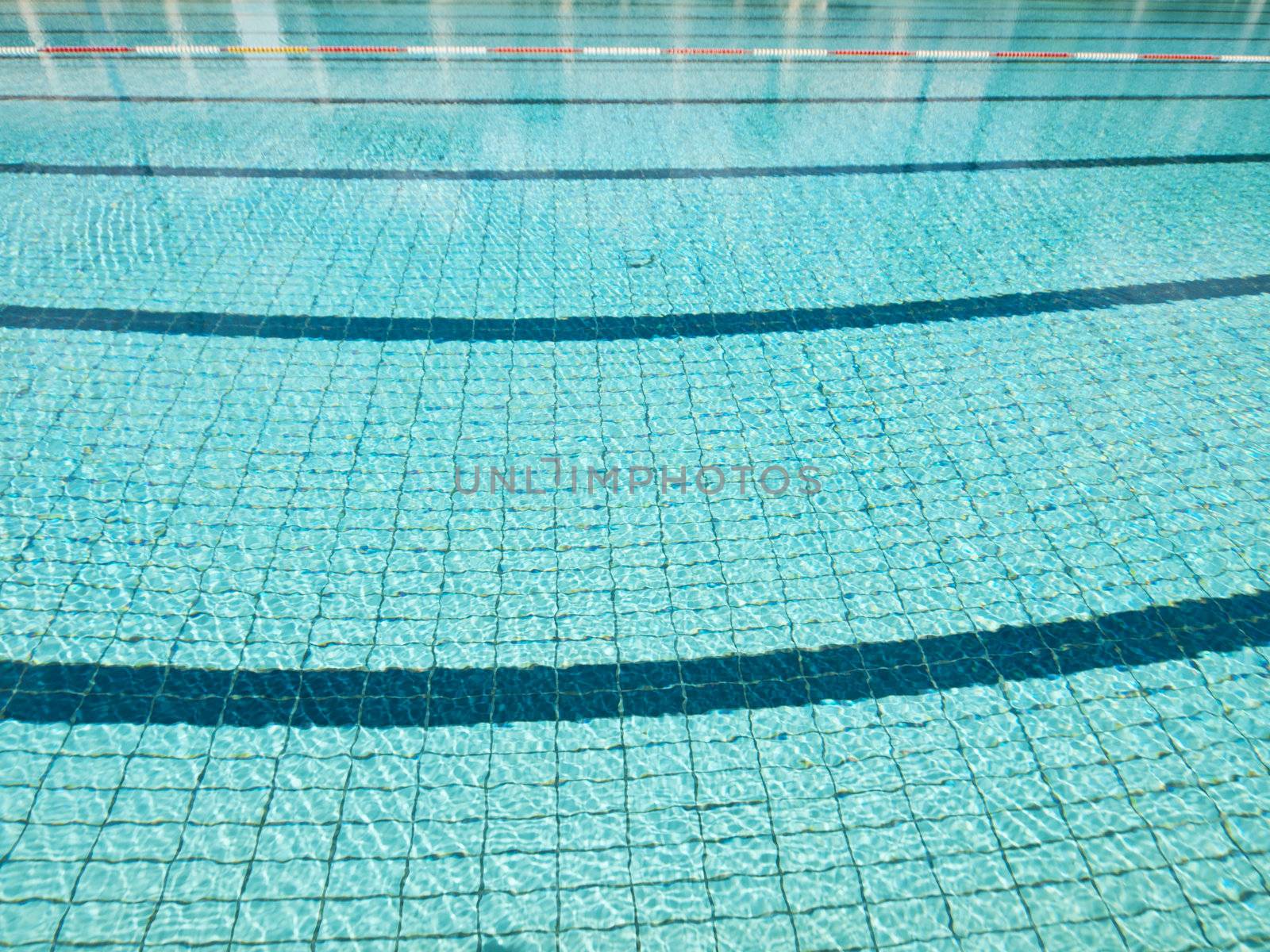 Wide angle picture of a pool with lanes