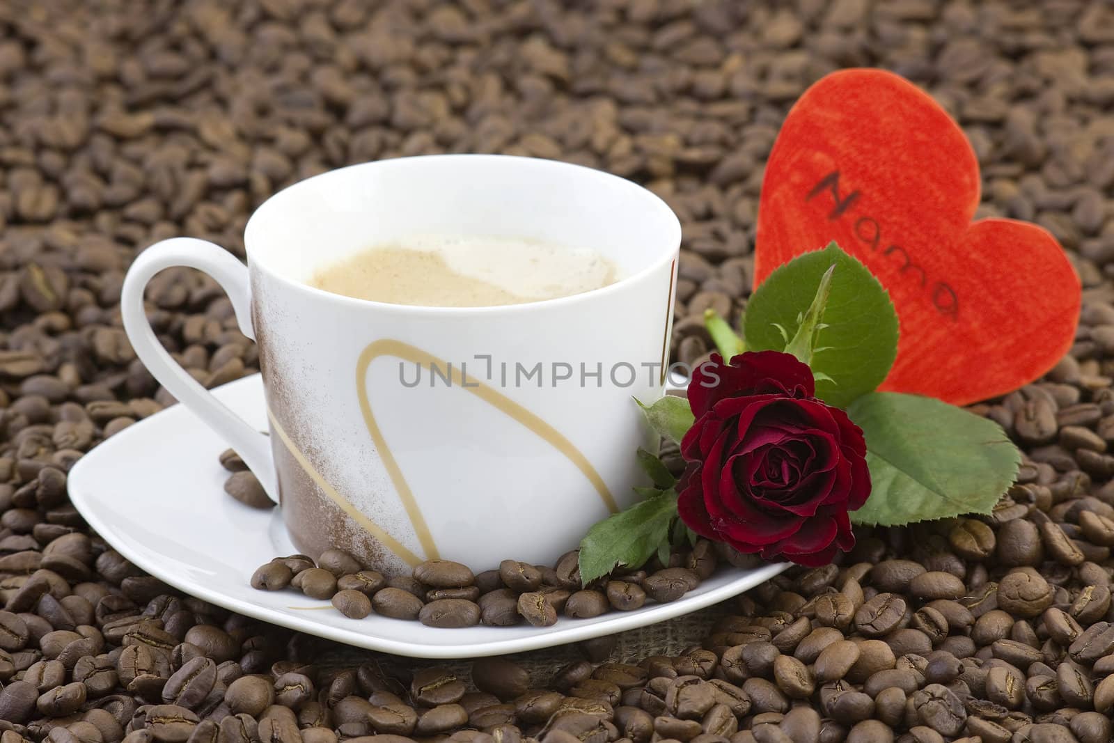 cup of coffee, red roses and heart