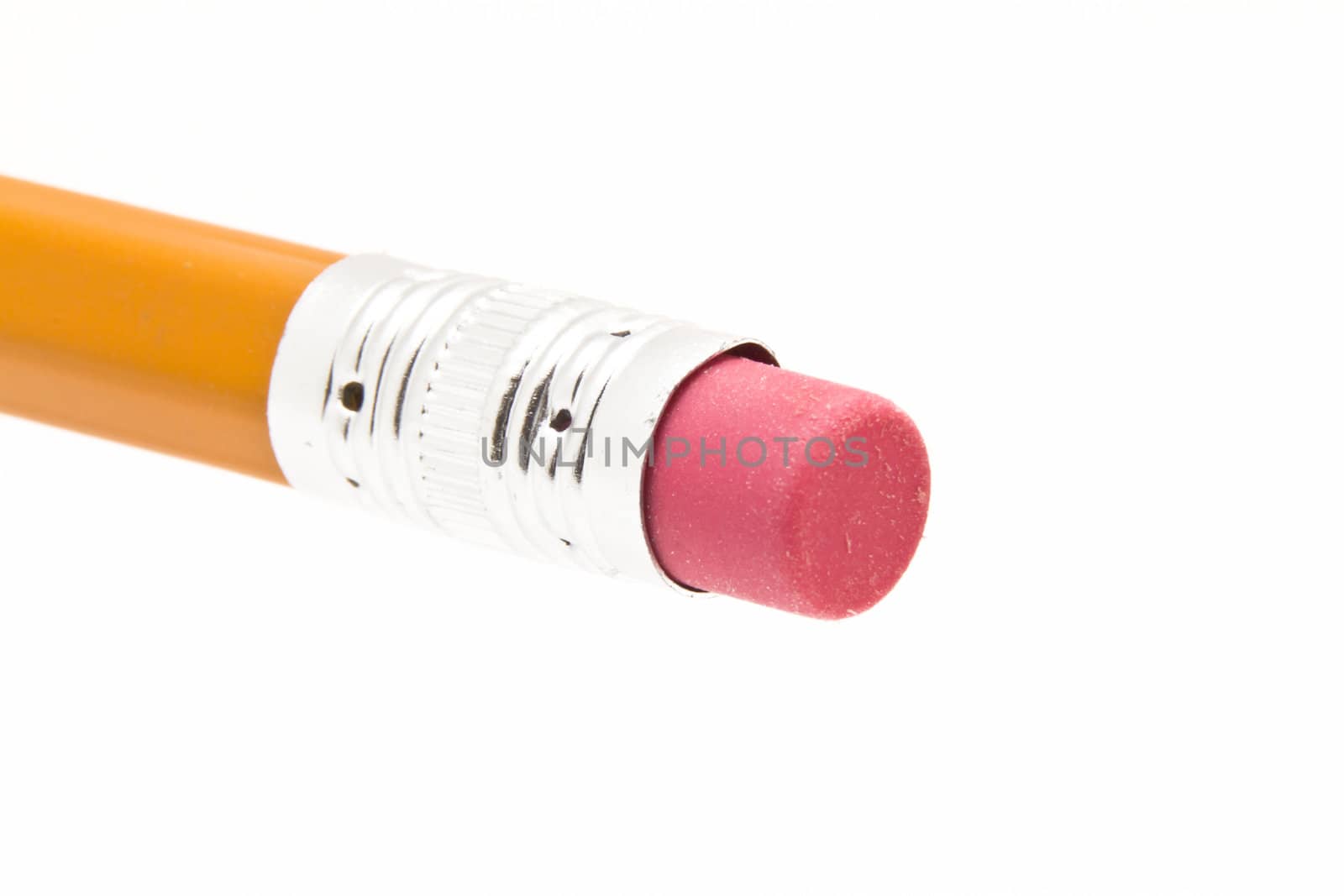 a close up shot of a pencil eraser isolated on a white background