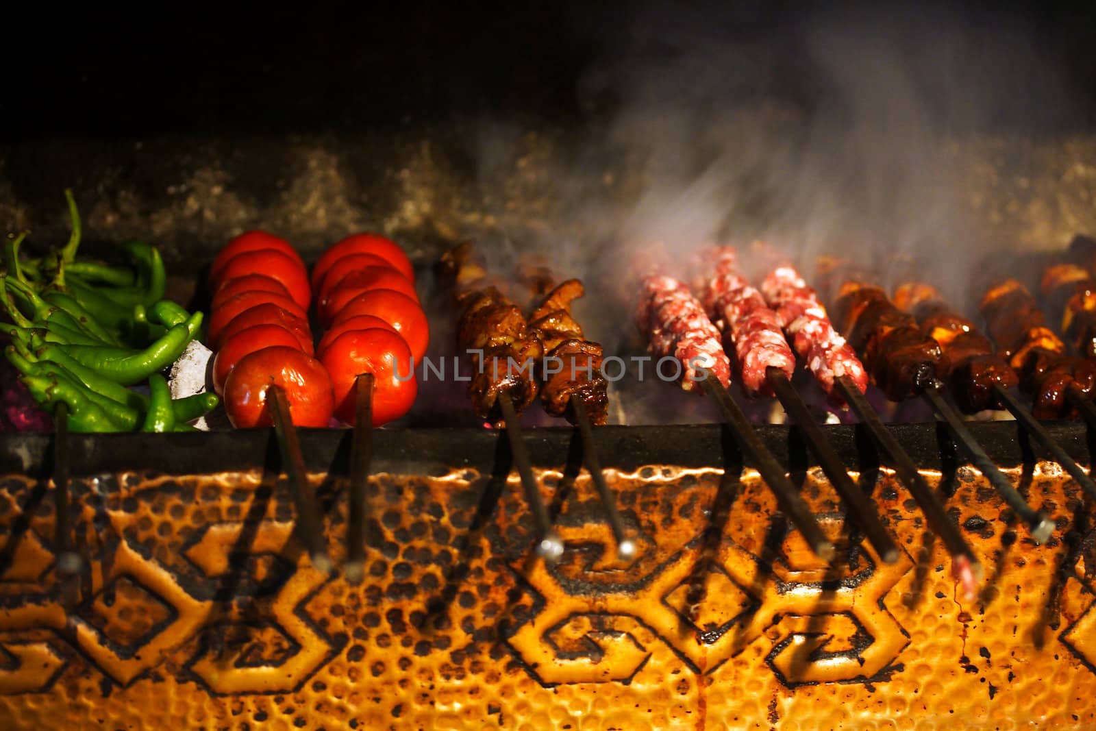 Grill with kebab , pepperoni, tomatos and chicken