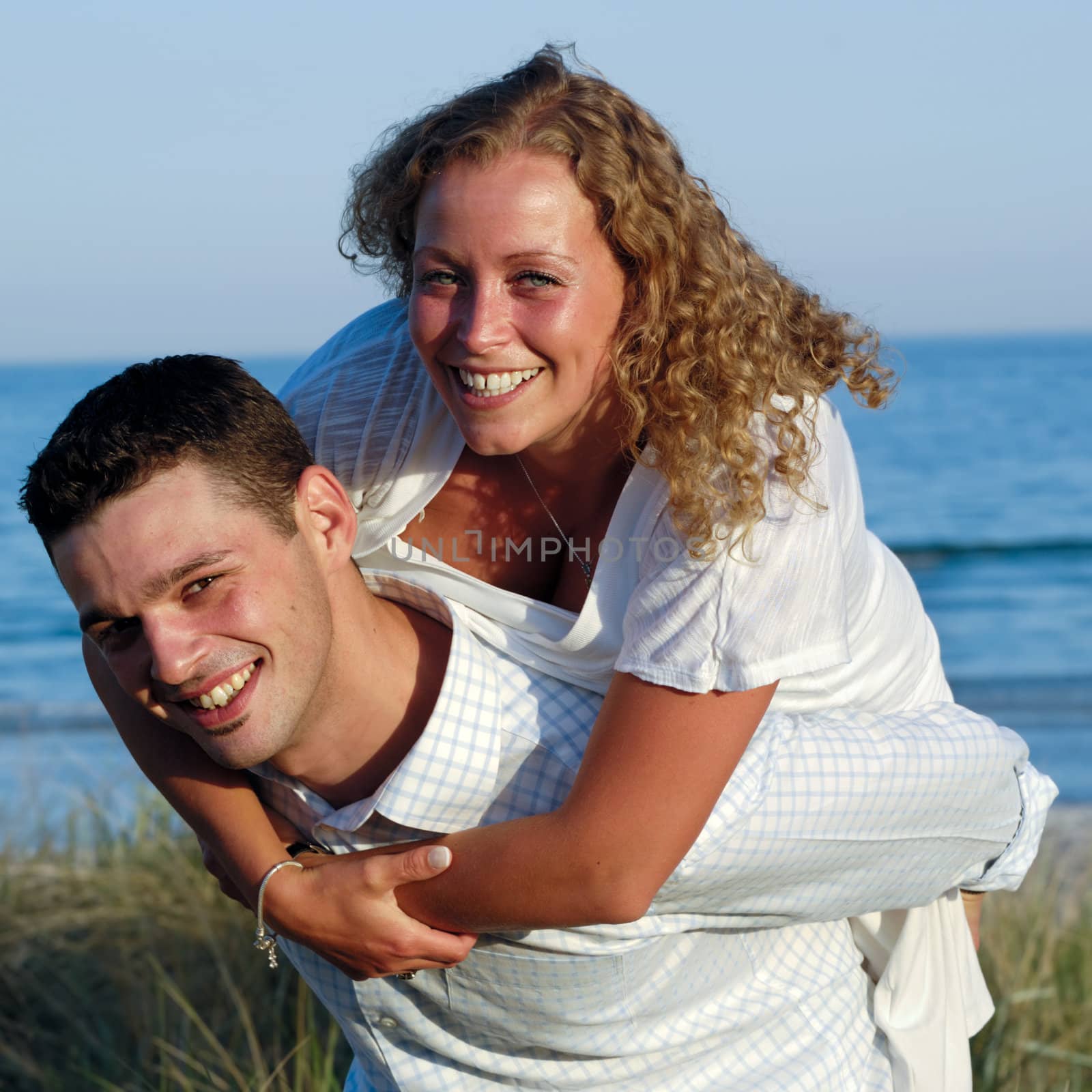 Young couple having fun by cfoto