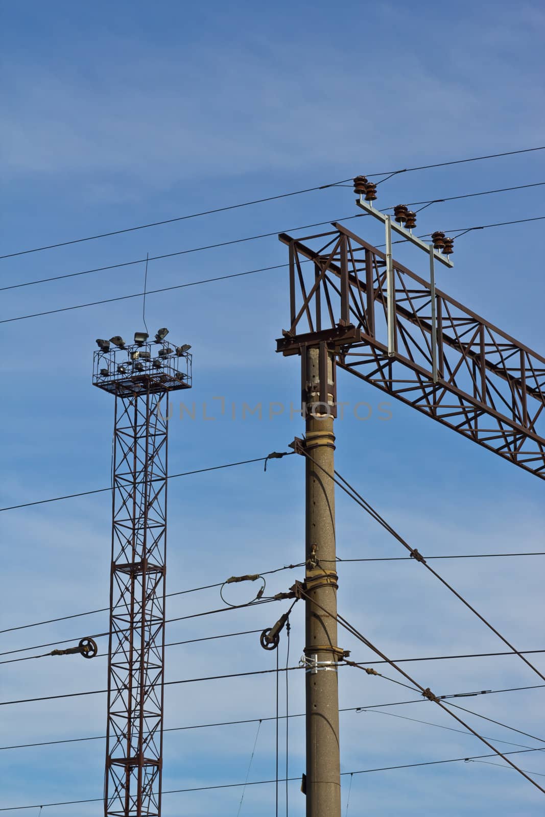 Electric pole on the rail and Metal Tower