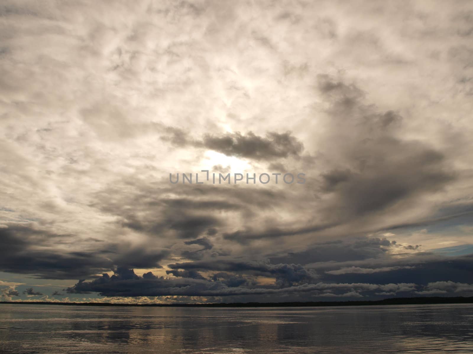 Sunset sky over spetacular Amazon by Alminaite