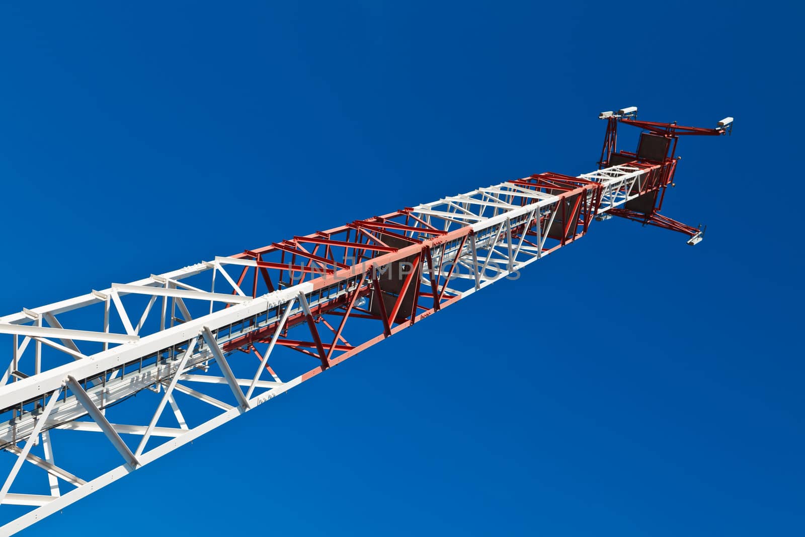 Communications tower with a beautiful blue sky