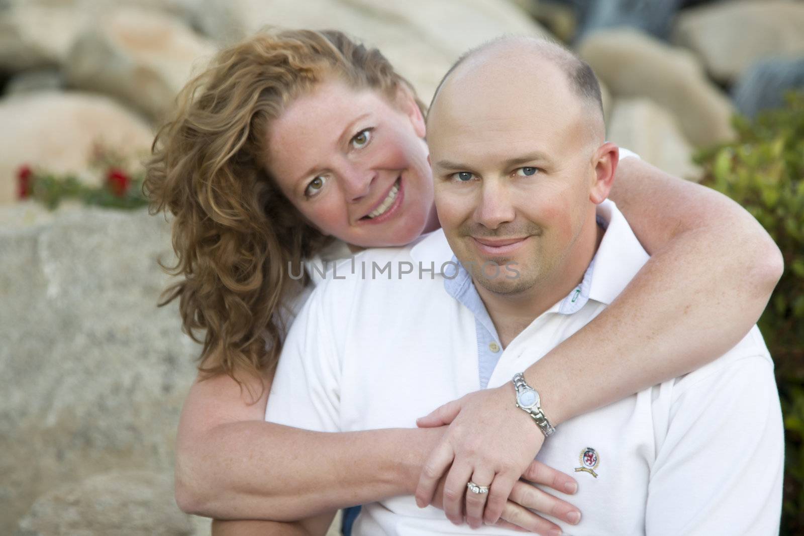 Attractive Couple Pose for Portrait in the Park.