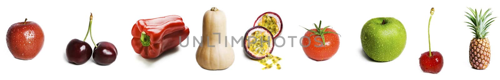 A selection of ripe, fresh, organic fruit and veg isolated onwhite