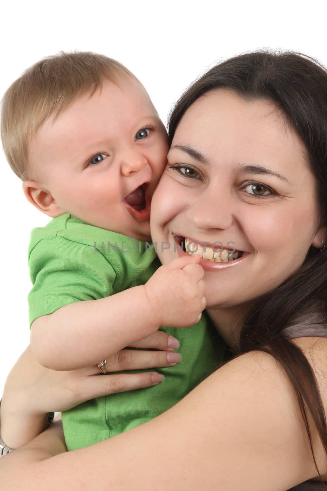 Young mother and baby boy hugging one another