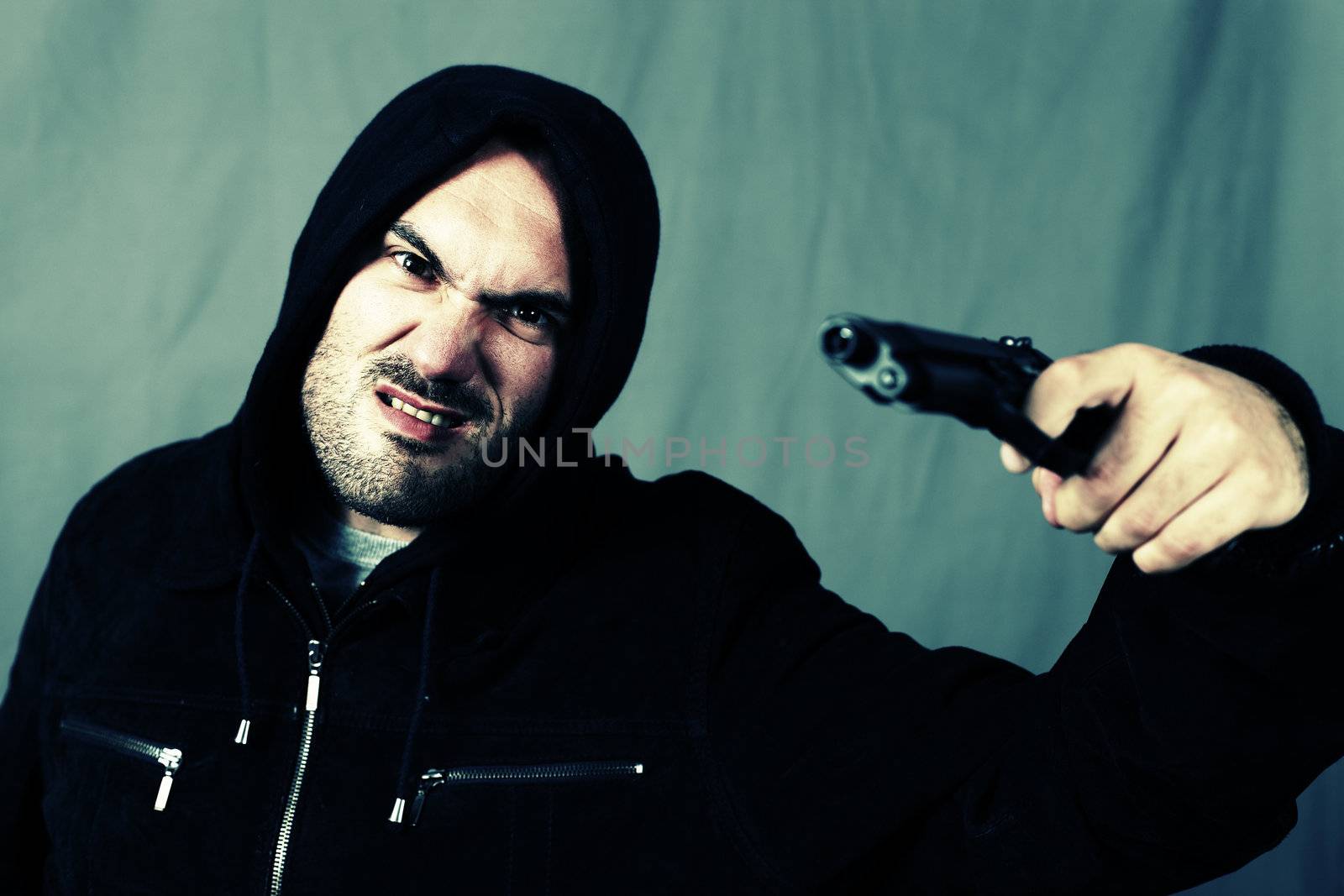 man with a gun and special photographic processing