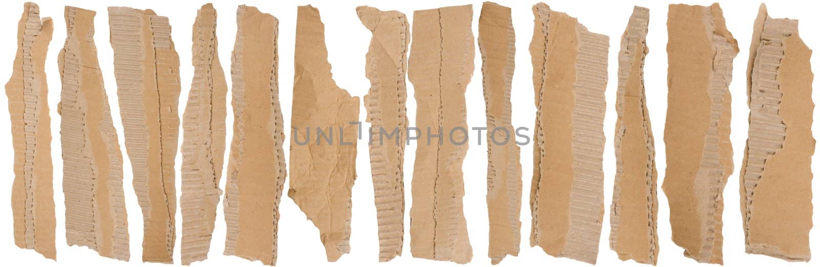 Pieces of torn brown corrugated cardboard, Isolated on White Background