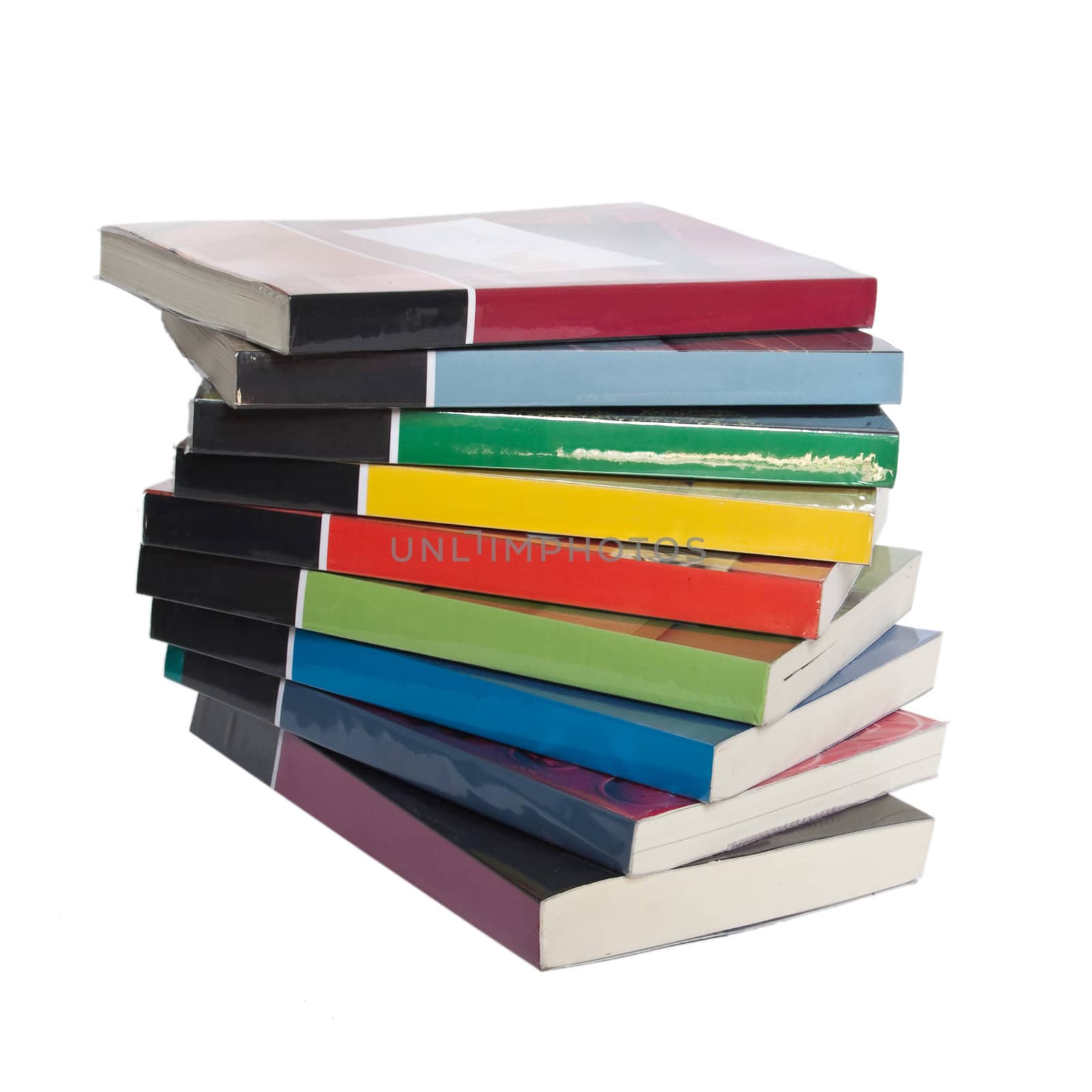 Twisted stack of colorful real books by Exsodus