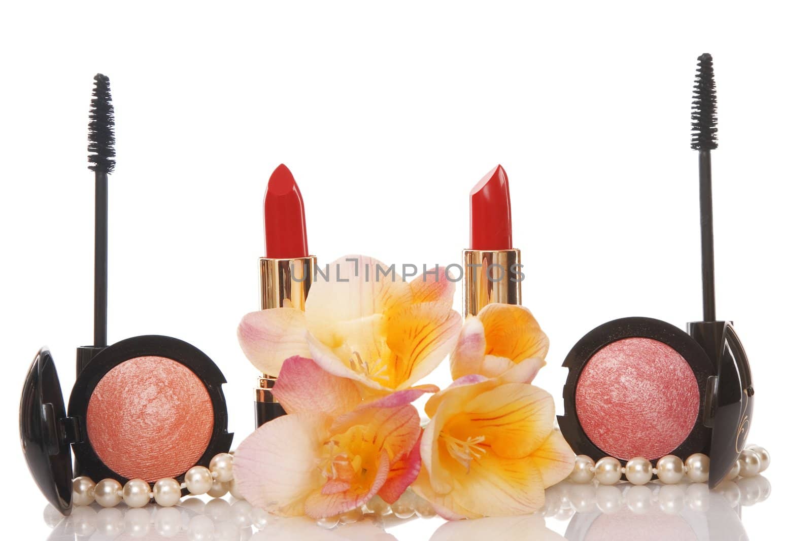 cosmetics and flower on white background, beauty concept