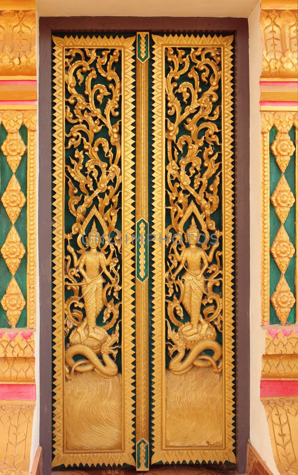 Buddhist temple door decoration in Paksong City, Champasak Province, Southern of Laos