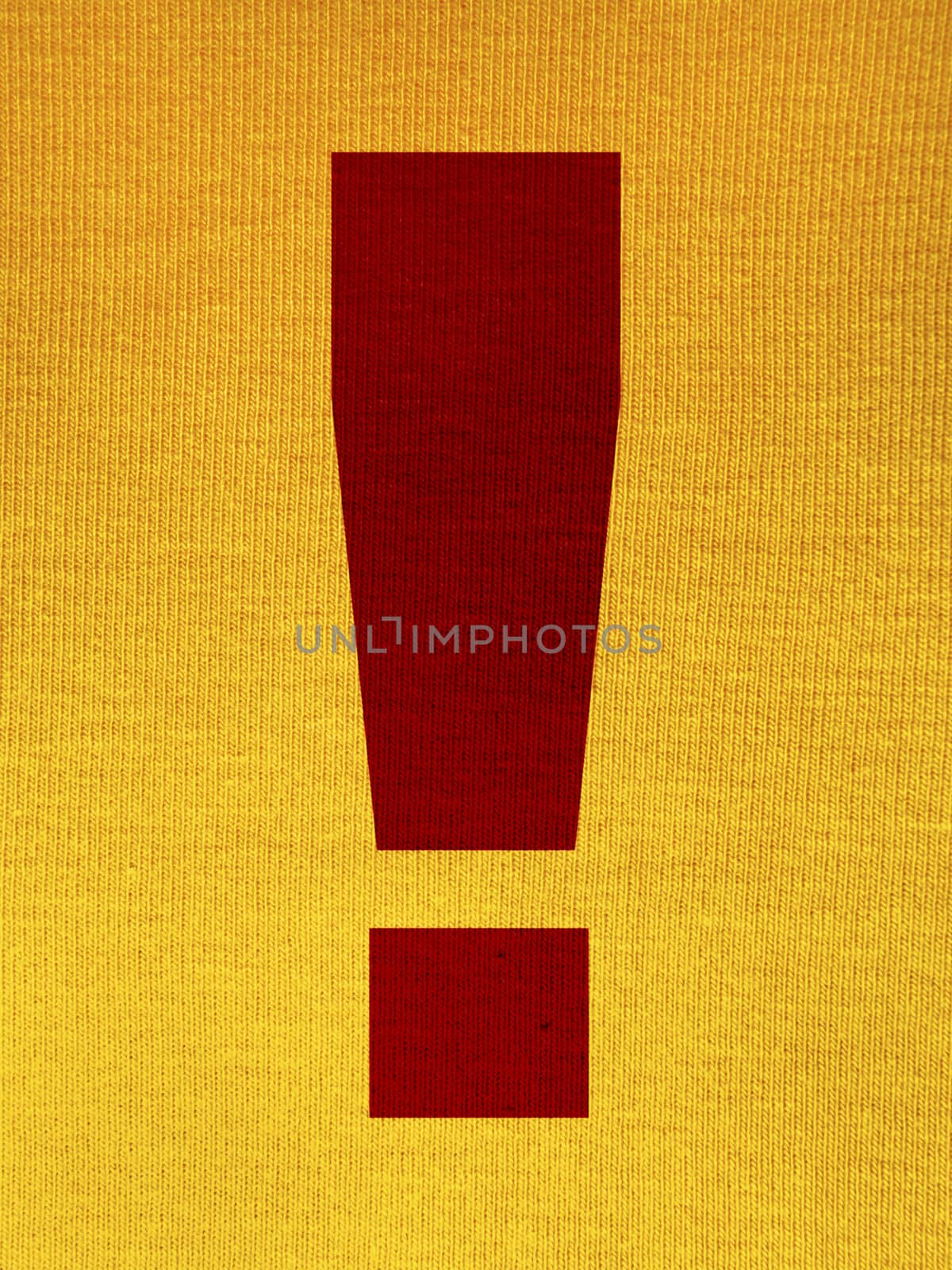 Exclamation point over a yellow tissue background